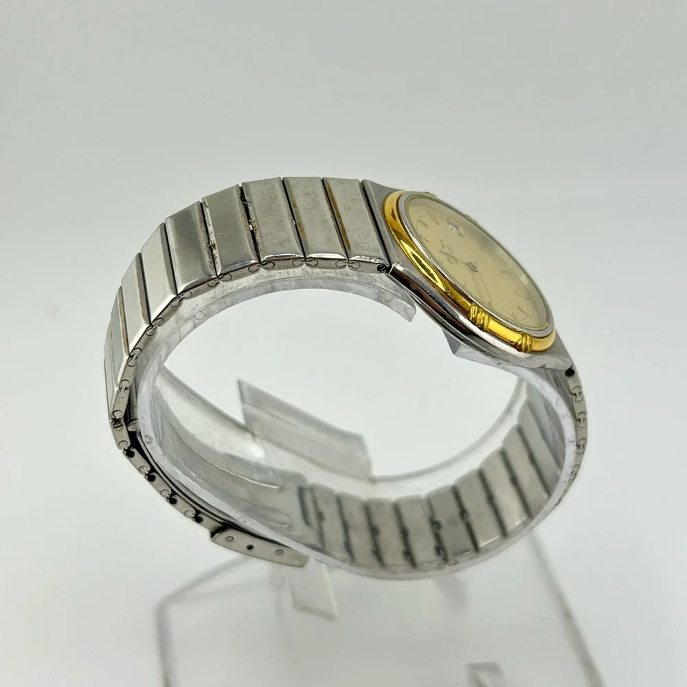 Vintage Bulova Quartz Silver and Gold stainless steel Watch #515
